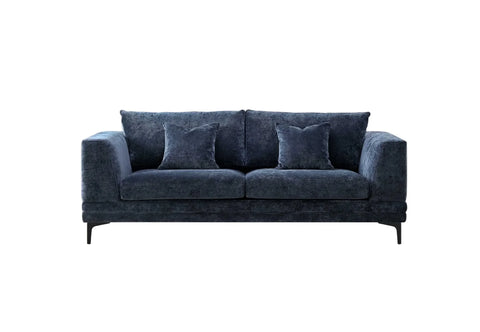 Luxury steel grey velvet sofa with a mid-century modern design, wooden plinth base, deep cushions.