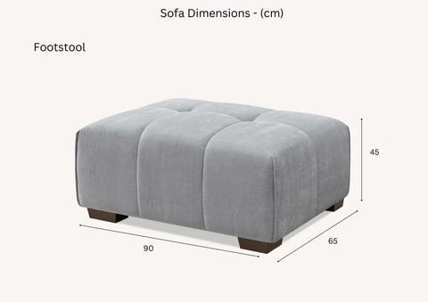 Luxury cloudy grey bouclé right-hand corner sofa with modular L-shaped design, block-stitched cushions, and five matching scatter cushions in a contemporary living room.
