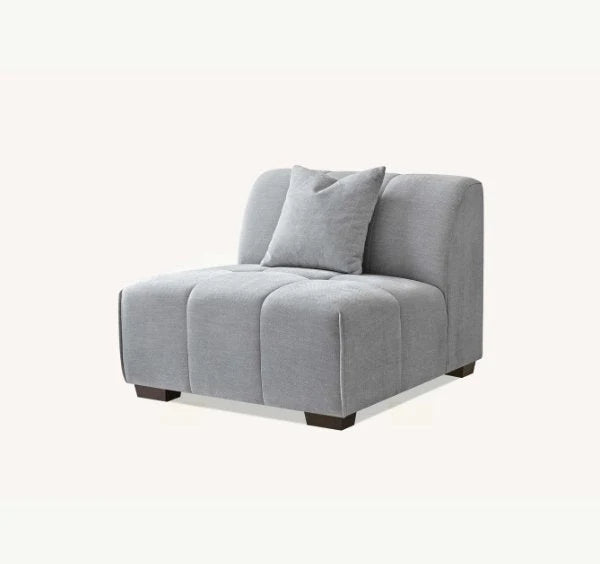 Luxury Leonard modular corner sofa upholstered in cloudy grey bouclé fabric featuring block-stitched cushions, spacious L-shaped seating, and contemporary styling for modern UK homes.