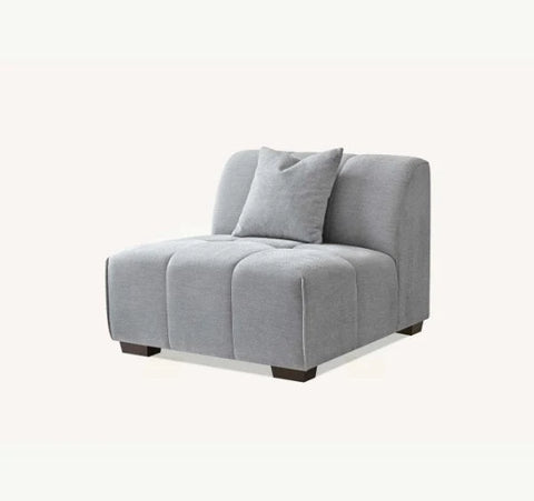 Luxury Leonard modular corner sofa upholstered in cloudy grey bouclé fabric featuring block-stitched cushions, spacious L-shaped seating, and contemporary styling for modern UK homes.