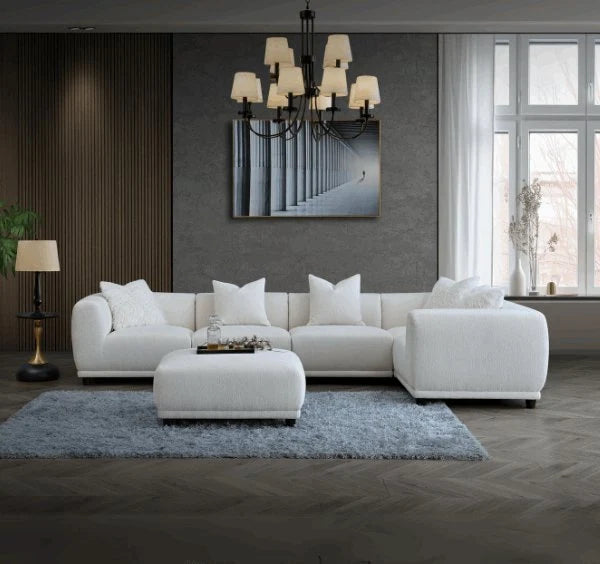 Luxury Lottie modular corner sofa upholstered in premium polar bouclé fabric featuring deep seating, soft curved lines, modular configuration, and contemporary styling for modern UK living rooms.
