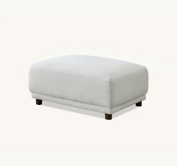 Luxury Lottie modular corner sofa upholstered in premium polar bouclé fabric featuring deep seating, soft curved lines, modular configuration, and contemporary styling for modern UK living rooms.