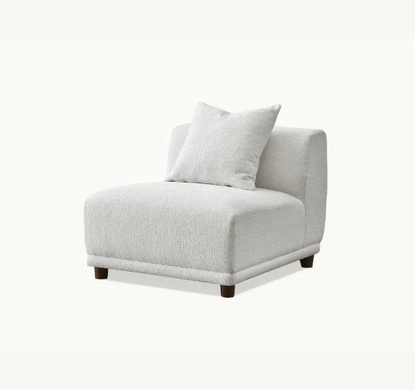 premium polar bouclé fabric featuring deep seating, soft curved lines, modular configuration, and contemporary styling for modern UK living rooms.