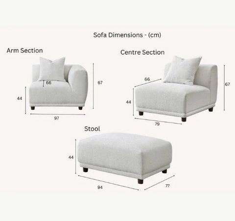 Luxury Lottie modular corner sofa upholstered in premium polar bouclé fabric featuring deep seating, soft curved lines, and contemporary styling for modern UK living rooms.