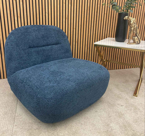 Modern Miami bouclé swivel armchair for stylish living room interiors.