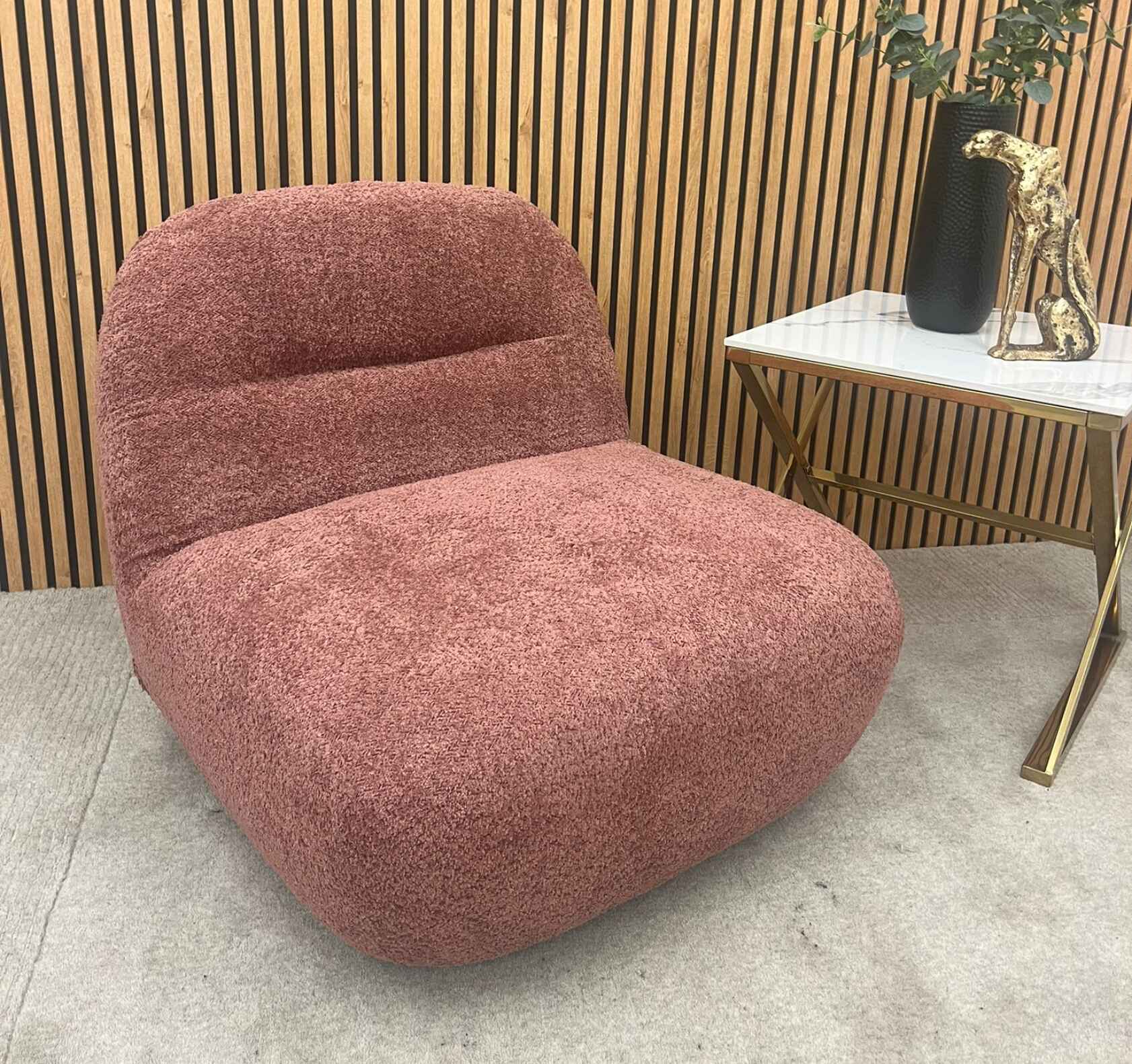 Miami modern swivel chair with premium textured bouclé upholstery.
