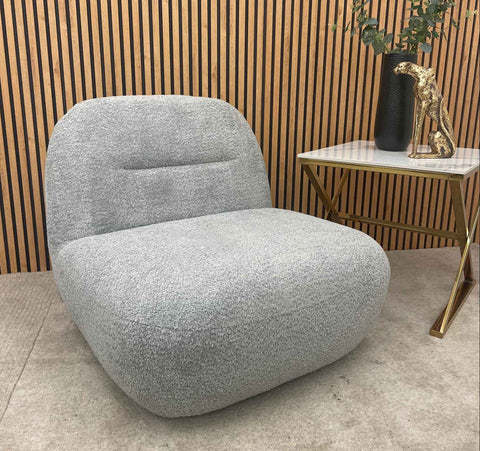 Stylish Miami accent swivel chair designed for comfortable living room seating.