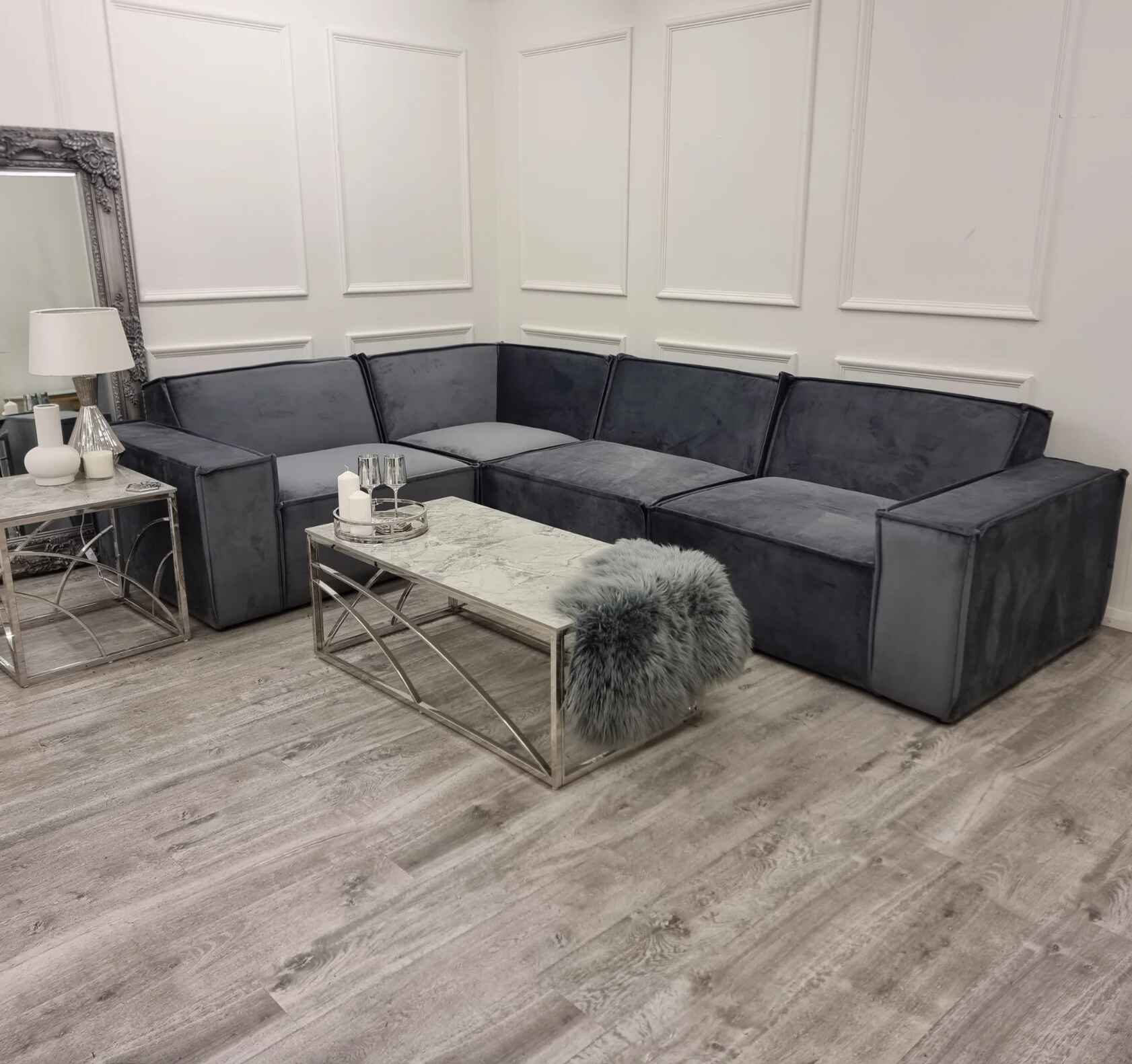 Luxury Midland 4-seater velvet corner sofa with deep cushioned seating, premium velvet upholstery, and a spacious contemporary design for modern UK living rooms.