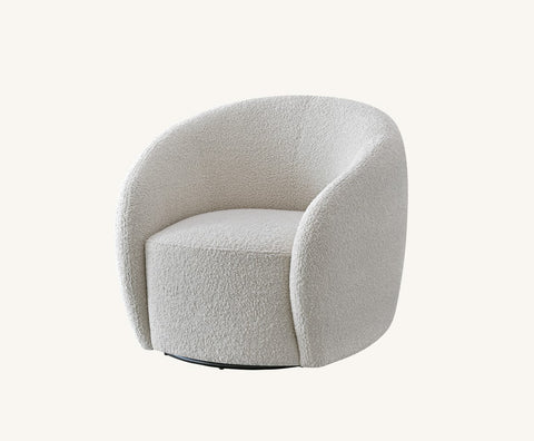 Modern Nolita bouclé armchair for stylish contemporary living rooms.