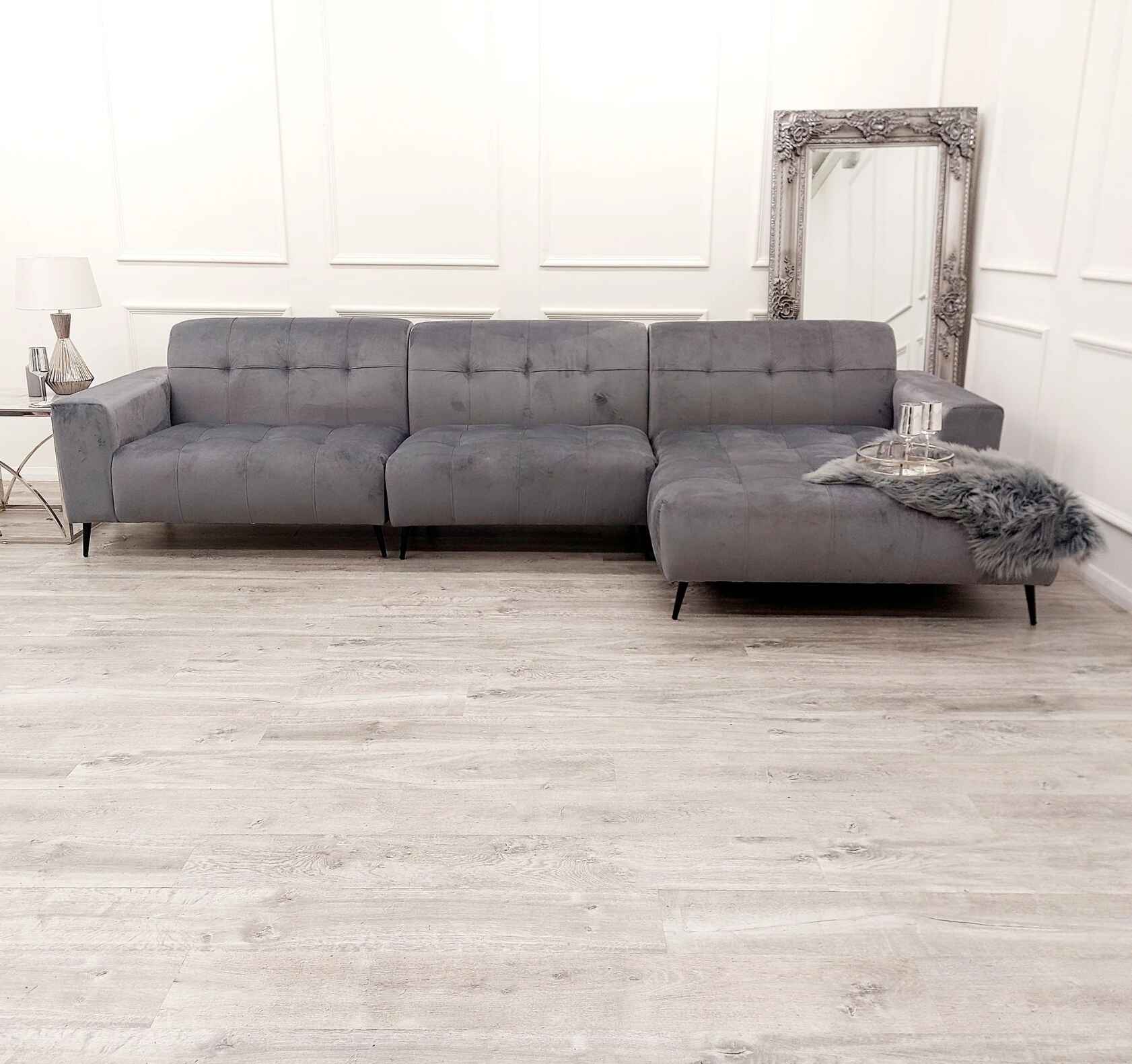 Luxury Oslo open plan cinema sofa with plush velvet upholstery, deep cushioned seating, extended chaise lounge, and spacious contemporary corner design for modern UK living rooms.