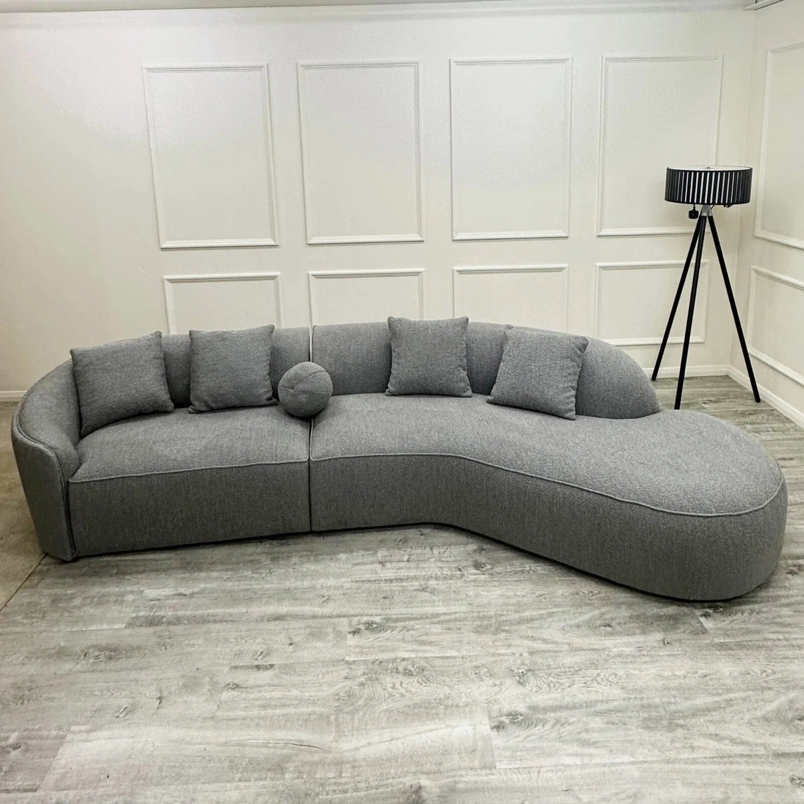 Pebble Bouclé Sofa with a sculptural curved design, soft textured bouclé upholstery, deep cushions, and premium comfort for modern UK living rooms.