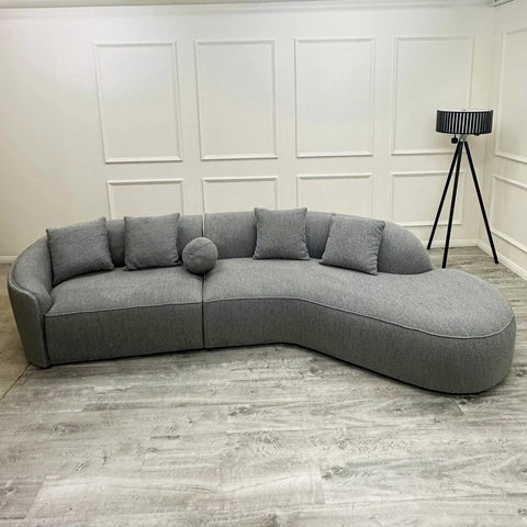 Pebble Bouclé Sofa with a sculptural curved design, soft textured bouclé upholstery, deep cushions, and premium comfort for modern UK living rooms.