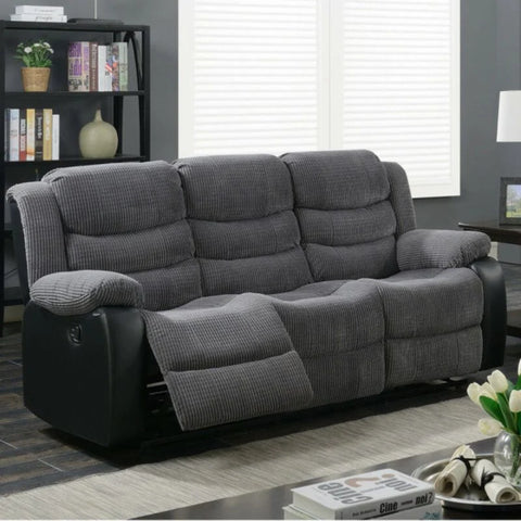 Stylish 3 seater grey cord fabric recliner sofa with reclining seats.