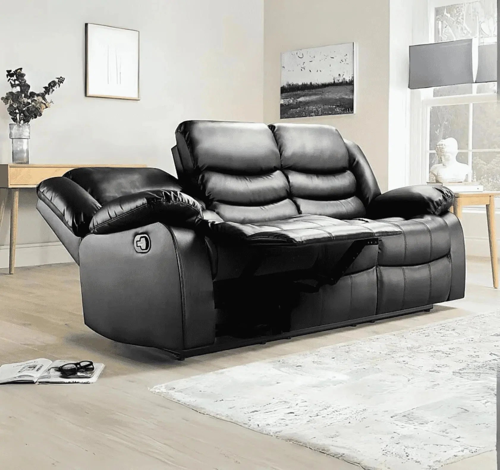 Modern black air leather 3 seater recliner sofa for contemporary living rooms.