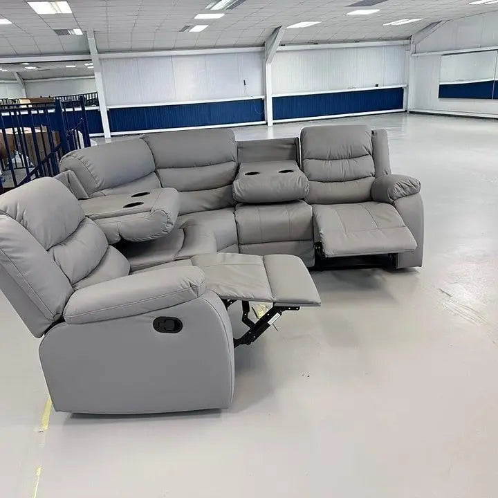 Premium dark grey leather-look corner sofa with spacious 5 seater configuration.