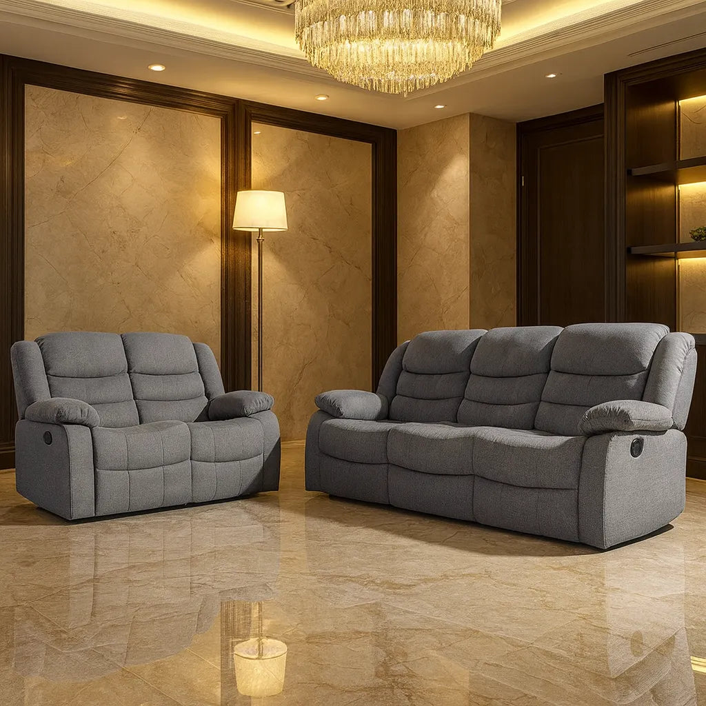 Spacious grey chenille corner recliner sofa with plush cushions and padded armrests.