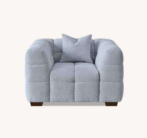 Luxury Tribeca Pearl Bouclé sofa featuring sculptural curved arms, deep channel stitching, premium textured upholstery.