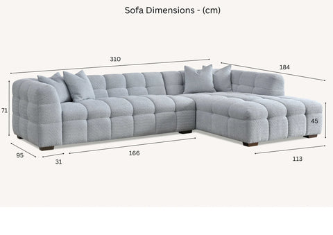 Bouclé corner sofa with chaise and matching footstool in iron grey.