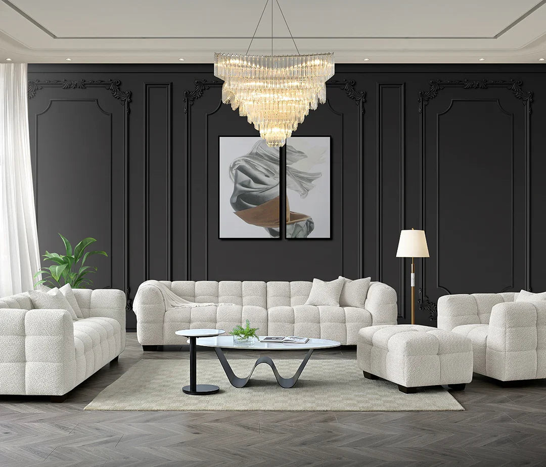 Luxury Tribeca oatmeal bouclé sofa with sculptural curved silhouette, deep channel stitching, premium textured upholstery, and contemporary designer styling for modern UK homes.